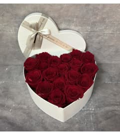 RED ROSES PRESERVED. An arrangement by Sweet Blossoms.