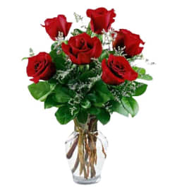 Heartbeat. An arrangement by Harriet's Flower and Gift Shop.