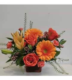 Orange crush bouquet. An arrangement by Flower Trends Florists.