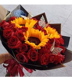 Love and Sunshine. An arrangement by Paty's Florist.