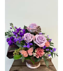 Butterfly Kisses- Lav. An arrangement by Blossoms On The Trail.