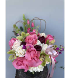 Alysse. An arrangement by Blue Iris Florist.