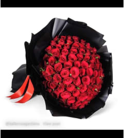 100 red roses luxury bouquet. An arrangement by BellaRosa Gardens.
