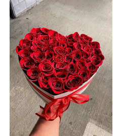 24-30 ROSES IN HEART SHAPE BOX. An arrangement by BellaRosa Gardens.