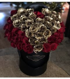 50 GOLD AND RED ROSES HEART BOX. An arrangement by BellaRosa Gardens. 50 GOLD AND RED ROSES HEART BOX. An arrangement by BellaRosa Gardens.