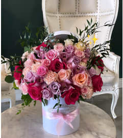 MI REYNA BOX. An arrangement by BellaRosa Gardens.