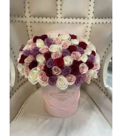 MIX COLORED ROSES BOX. An arrangement by BellaRosa Gardens.