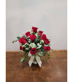 Love is Red Dozen Rose Arrangement. An arrangement by Fields of Heather Floral Design.