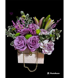 My Little Pink Purse. An arrangement by L and J Blooms.