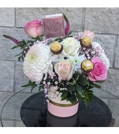 Blooms and Sweets. An arrangement by Blumz Floral Boutique.