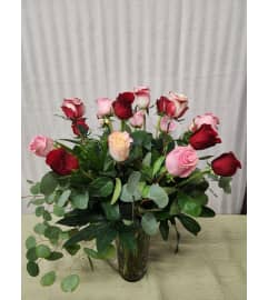 three for variety. An arrangement by Special Touch Florist.