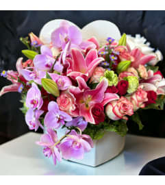 Spring of Blooms. An arrangement by Flower World and Gifts.