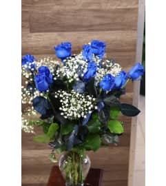12 Impossibly Blue Roses. An arrangement by Sonia's Florist.