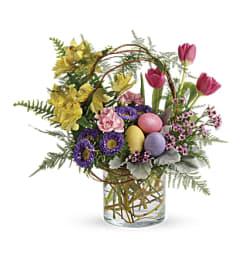 Pop Of Springtime - Easter. An arrangement by Love Story Florist.