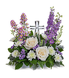 Poised with Love. An arrangement by Love Story Florist.