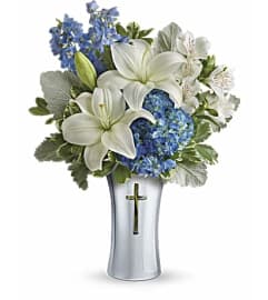 Skies Of Remembrance Cross Bouquet. An arrangement by Love Story Florist.