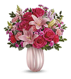 ROSY SWIRLS BOUQUET - MD8A-24. An arrangement by Palmetto Gardens Florist.