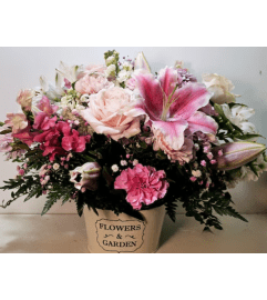 TRIPLE A'S BLOSSOM OF PINK. An arrangement by Triple A Florist.