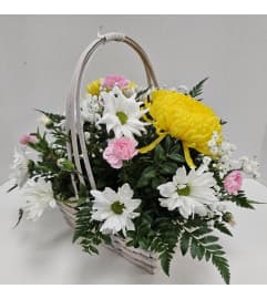 Wishing You Well Basket Arrangement. An arrangement by Balloon Bouquets Plus.