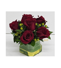 Cute Cube Rose. An arrangement by Brickell Exclusive Blooms.
