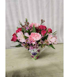 A Lovely Coffee Break. An arrangement by Special Touch Florist.