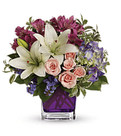 Garden Romance By Teleflora. An arrangement by Shalimar Flower Shop.
