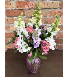 By Design Lovely Lavender. An arrangement by Flowers By Design.