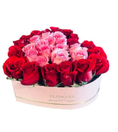 Pink Heart Bicolor. An arrangement by Charming Blooms.