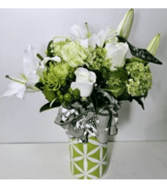 TIPLE A'S ST. PATRICKS IRISH STEP DANCE. An arrangement by Triple A Florist.
