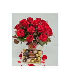 Two Dozen Roses and Chocolate. An arrangement by Brickell Exclusive Blooms.