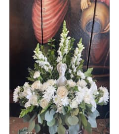 Heartfelt Condolences. An arrangement by Rose Flowers.