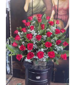 24 Red Roses Basket. An arrangement by Rose Flowers.