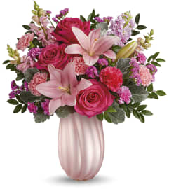 Rosy Swirls Bouquet. An arrangement by Mardi Gras Florist.