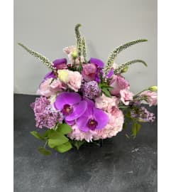 Lush Pink Arragement. An arrangement by Elegant Florist.