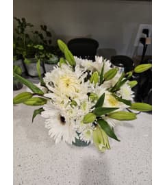 Serenity vase. An arrangement by Enchanted Flowers. Serenity vase. An arrangement by Enchanted Flowers.