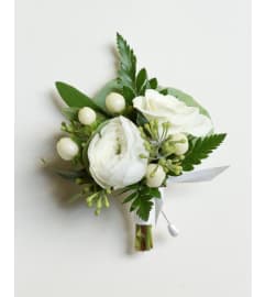 White Boutonniere. An arrangement by Twigs Flower Company.