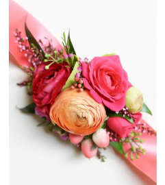 Colorful Wrist Corsage. An arrangement by Twigs Flower Company.