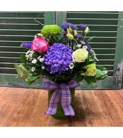 Beams of Purple Vase. An arrangement by Forest Florist.