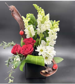 Woodland Collection- Lady Bugs. An arrangement by Blossoms On The Trail.