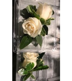 Ivy Corsage Set. An arrangement by Charming Blooms.
