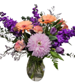 Delightfully Yours. An arrangement by Harriet's Flower and Gift Shop.