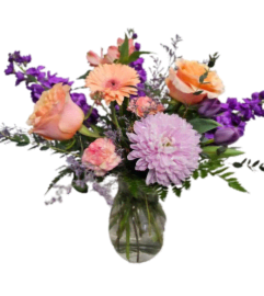 Delightfully Yours. An arrangement by Harriet's Flower and Gift Shop.