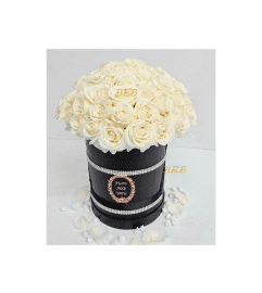 White Exclusive Rose Box. An arrangement by Brickell Exclusive Blooms.