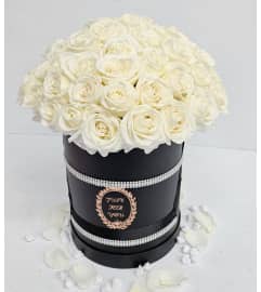 Unique White Box. An arrangement by Aventura Blooming Petals.