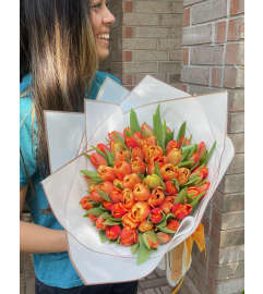 Wrapped spring bouquet. An arrangement by Eternity Flowers US.