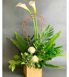 Tropical Bliss By Twigs And Blooms Florist. An arrangement by Twigs and Blooms Florist.