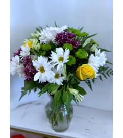 FTD Sweet Delight. An arrangement by Anderson Flowers.