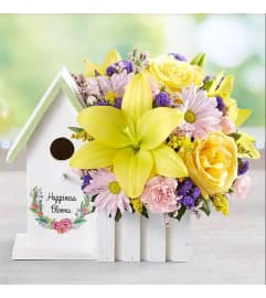 Blooming Birdhouse Bouquet. An arrangement by Sueppel's Flowers.