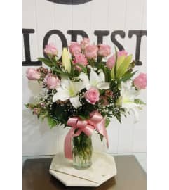 Sweet Pink Bouquet. An arrangement by Geni's Florist and Gifts.