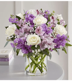 White and Lavender Exclusive. An arrangement by Aventura Glamour Flowers.